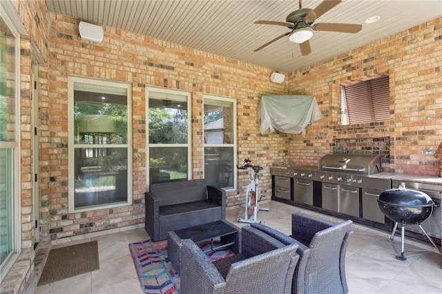 809 S Corniche Du Lac, Covington, LA 70433 - view of patio featuring ceiling fan, area for grilling, and outdoor lounge area