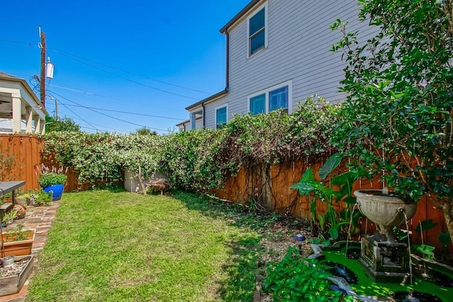 view of yard featuring fence