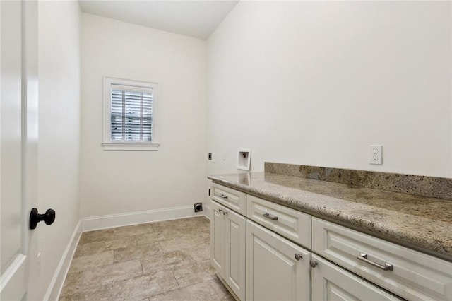 bathroom featuring baseboards