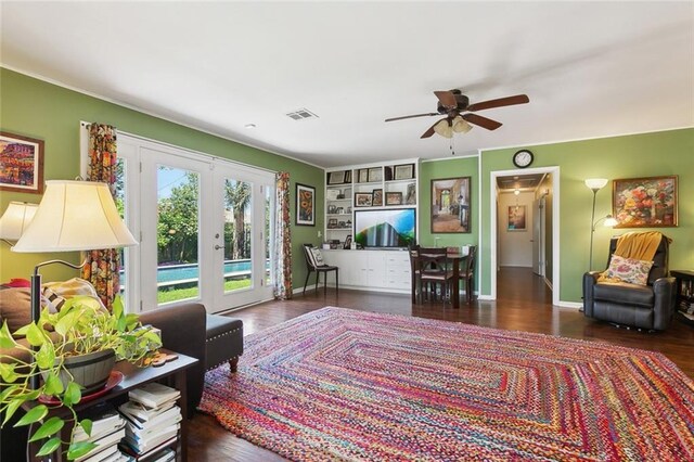 3000 Clifford Dr, Metairie, LA 70002 - living room with wood finished floors, visible vents, french doors, and ceiling fan