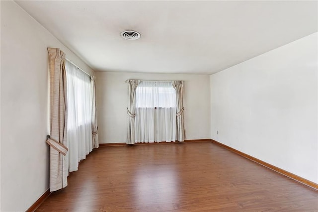1017 Elmeer Ave, Metairie, LA 70005 - unfurnished room with wood finished floors and baseboards