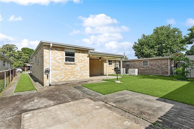 1017 Elmeer Ave, Metairie, LA 70005 - rear view of property with a patio area and brick siding