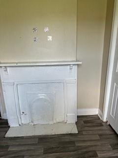 interior details with wood finished floors and baseboards
