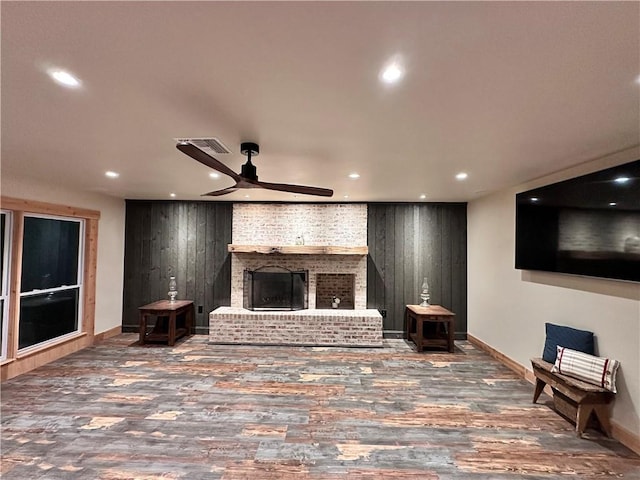 130 N Oak Ct, Luling, LA 70070 - living area featuring wood finished floors, ceiling fan, recessed lighting, and a brick fireplace