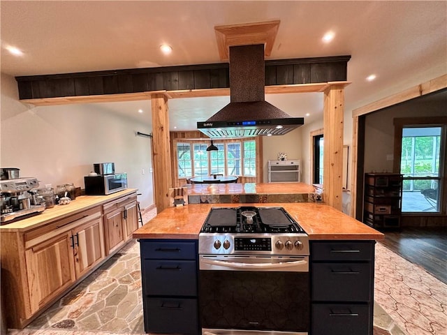 130 N Oak Ct, Luling, LA 70070 - kitchen with appliances with stainless steel finishes, extractor fan, wood counters, plenty of natural light, and recessed lighting