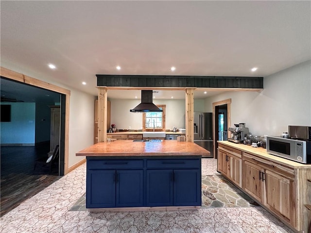 130 N Oak Ct, Luling, LA 70070 - kitchen with high end refrigerator, island range hood, recessed lighting, a center island, and wooden counters
