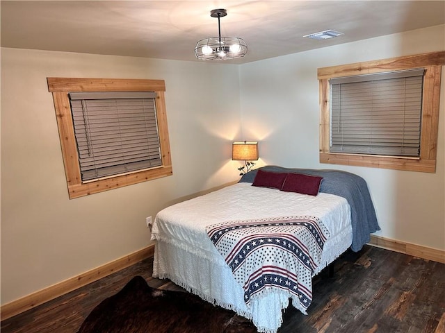 130 N Oak Ct, Luling, LA 70070 - bedroom featuring baseboards and wood finished floors