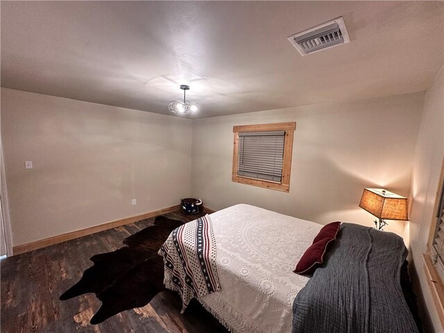 130 N Oak Ct, Luling, LA 70070 - bedroom featuring wood finished floors and baseboards