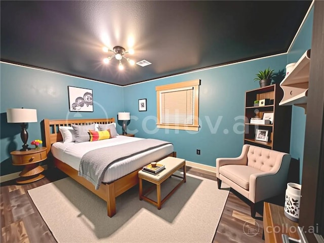 130 N Oak Ct, Luling, LA 70070 - bedroom with dark wood-style flooring and baseboards