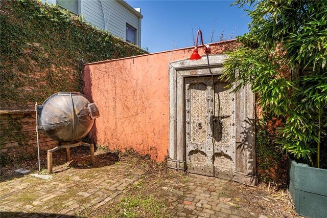 view of entry to storm shelter
