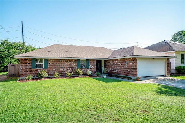 61 Parlange Dr, Destrehan, LA 70047 - ranch-style home with an attached garage, concrete driveway, a front yard, and brick siding