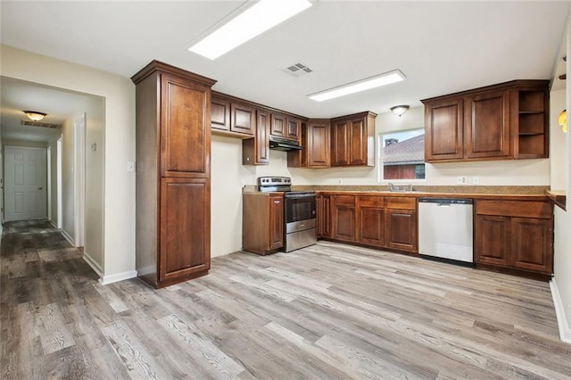 kitchen with visible vents, open shelves, appliances with stainless steel finishes, under cabinet range hood, and light wood-style flooring