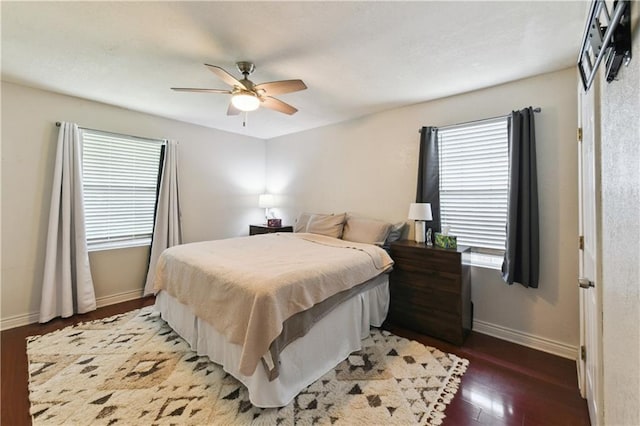 5387 Chamberlain Dr, New Orleans, LA 70122 - bedroom with baseboards, a ceiling fan, and wood finished floors