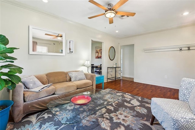 living room with wood finished floors, ornamental molding, a ceiling fan, and recessed lighting