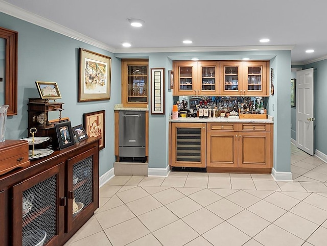 bar with indoor wet bar, refrigerator, recessed lighting, crown molding, and beverage cooler
