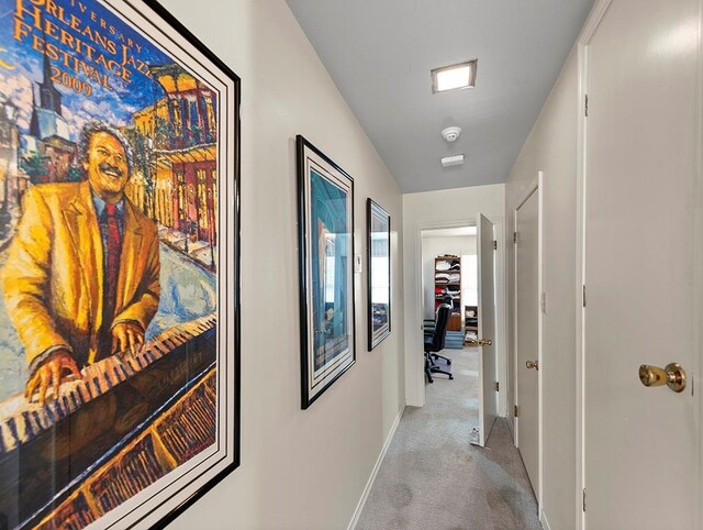 1643 S Norman Francis Pkwy, New Orleans, LA 70125 - hallway with carpet flooring, an office area, and baseboards