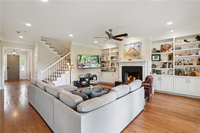 59 Spanish Fort Blvd, New Orleans, LA 70124 - living area featuring ornamental molding, a ceiling fan, and recessed lighting