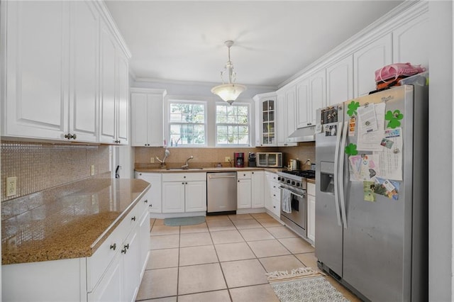 58 Fontainebleau Dr, New Orleans, LA 70125 - kitchen featuring appliances with stainless steel finishes, under cabinet range hood, and white cabinets