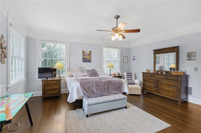 58 Fontainebleau Dr, New Orleans, LA 70125 - bedroom featuring a ceiling fan, baseboards, ornamental molding, and wood finished floors