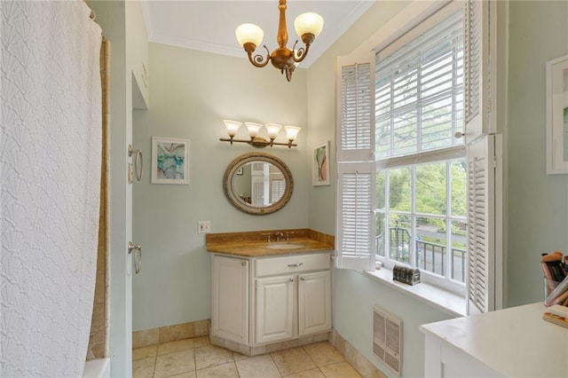 58 Fontainebleau Dr, New Orleans, LA 70125 - bathroom featuring baseboards, a wealth of natural light, vanity, and a chandelier