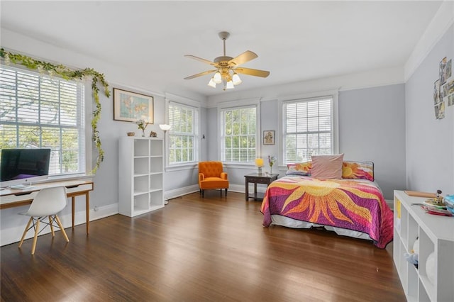 58 Fontainebleau Dr, New Orleans, LA 70125 - bedroom featuring baseboards, ceiling fan, and wood finished floors