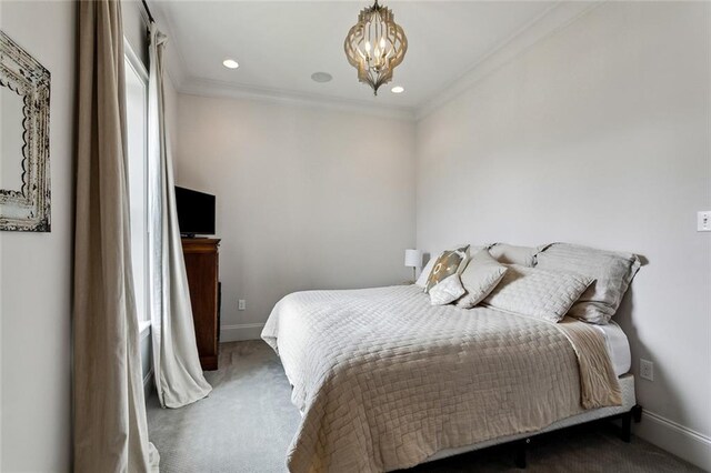 316 Sena Dr, Metairie, LA 70005 - bedroom with baseboards, crown molding, a chandelier, and carpet