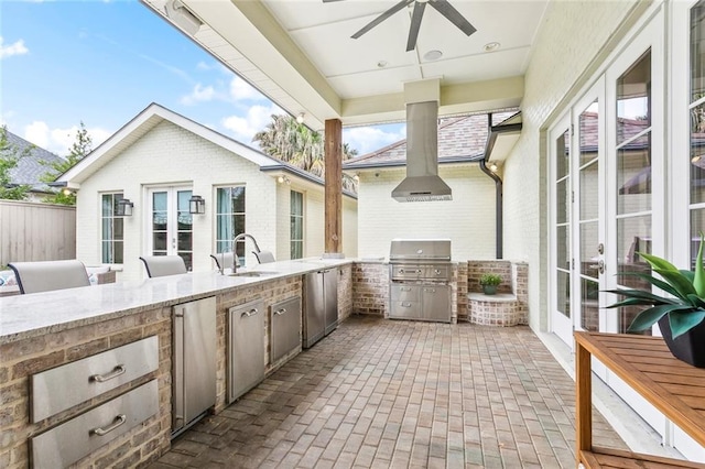 316 Sena Dr, Metairie, LA 70005 - view of patio / terrace featuring area for grilling, ceiling fan, exterior kitchen, and a sink