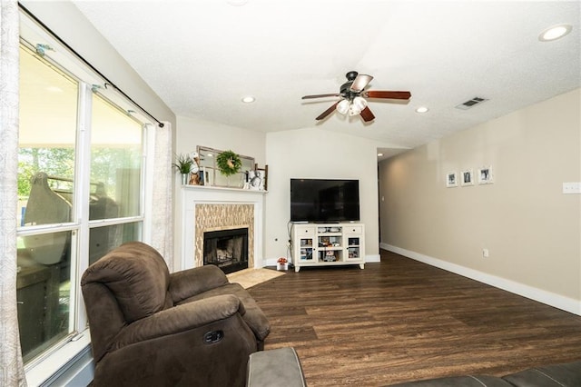 1025 Breckenridge Dr, Slidell, LA 70461 - living area featuring ceiling fan, a tiled fireplace, recessed lighting, and wood finished floors