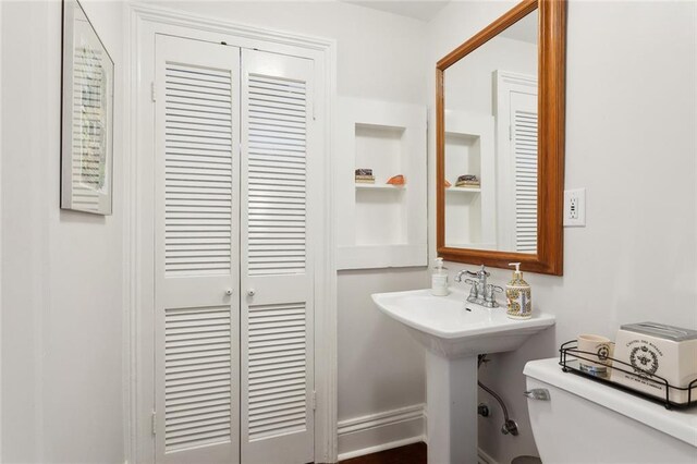 half bathroom with toilet