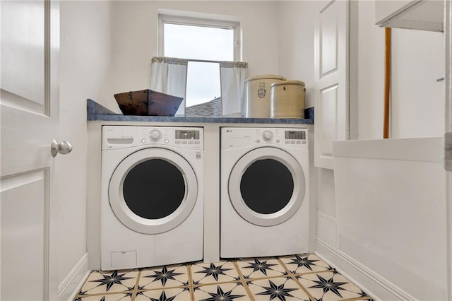 225 Ridgewood Dr, Metairie, LA 70005 - laundry area featuring light floors, washer and dryer, and laundry area