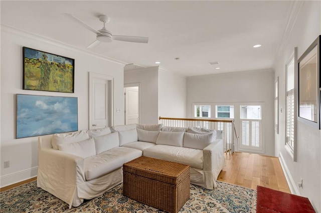 225 Ridgewood Dr, Metairie, LA 70005 - living area with crown molding, ceiling fan, recessed lighting, wood finished floors, and baseboards