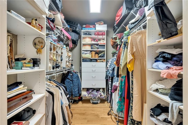225 Ridgewood Dr, Metairie, LA 70005 - walk in closet with wood finished floors