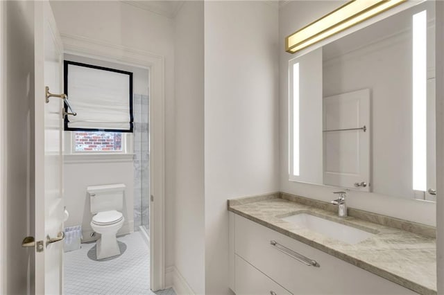225 Ridgewood Dr, Metairie, LA 70005 - full bath featuring a shower stall, vanity, ornamental molding, toilet, and tile patterned floors