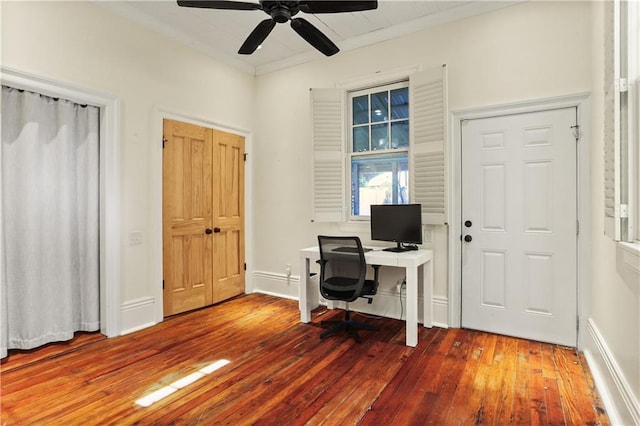 home office featuring ceiling fan, wood-type flooring, and ornamental molding