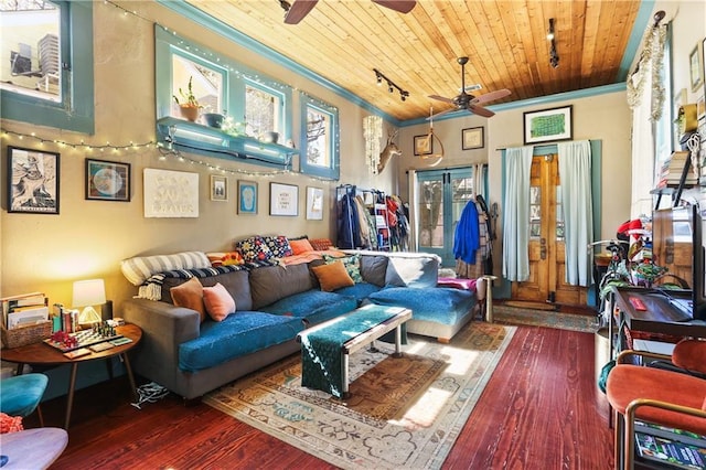 living room with ornamental molding, wood-type flooring, a ceiling fan, and wood ceiling