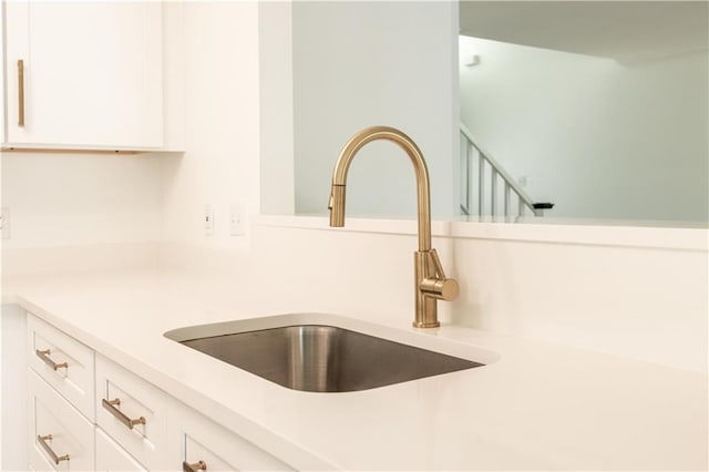272 Marina Dr, Slidell, LA 70458 - room details with a sink, light countertops, and white cabinets