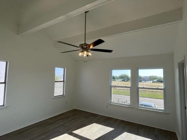 272 Marina Dr, Slidell, LA 70458 - empty room with dark wood-type flooring, lofted ceiling with beams, baseboards, and plenty of natural light
