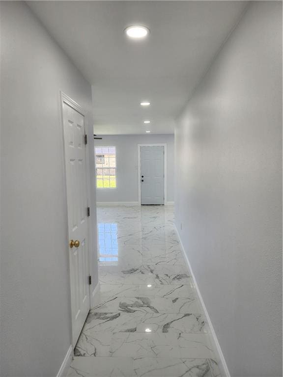 2405 Tattersall Dr, Harvey, LA 70058 - corridor featuring recessed lighting, marble finish floor, and baseboards