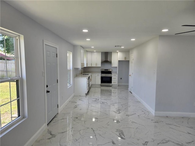 2405 Tattersall Dr, Harvey, LA 70058 - kitchen with wall chimney exhaust hood, stainless steel electric range oven, recessed lighting, a sink, and baseboards