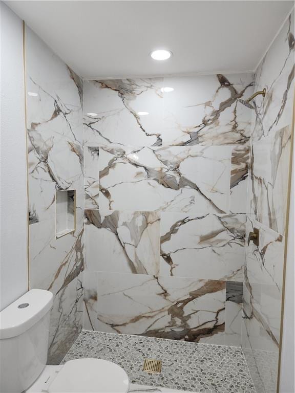 2405 Tattersall Dr, Harvey, LA 70058 - full bathroom featuring recessed lighting, a marble finish shower, and toilet