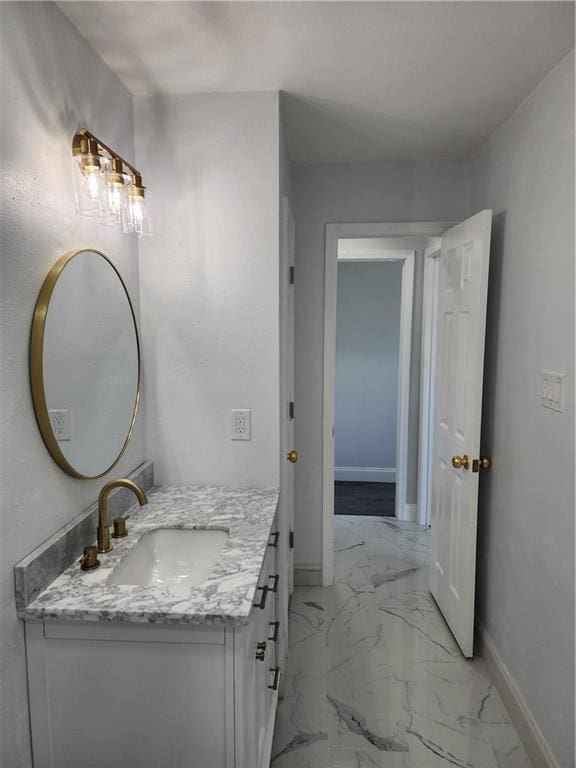 2405 Tattersall Dr, Harvey, LA 70058 - bathroom with baseboards, marble finish floor, and vanity