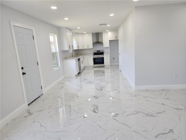 2405 Tattersall Dr, Harvey, LA 70058 - kitchen with a sink, baseboards, appliances with stainless steel finishes, and wall chimney exhaust hood
