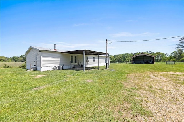 1510 Pumping Station Rd, Greensburg, LA 70441 - exterior space with a carport, a yard, and cooling unit