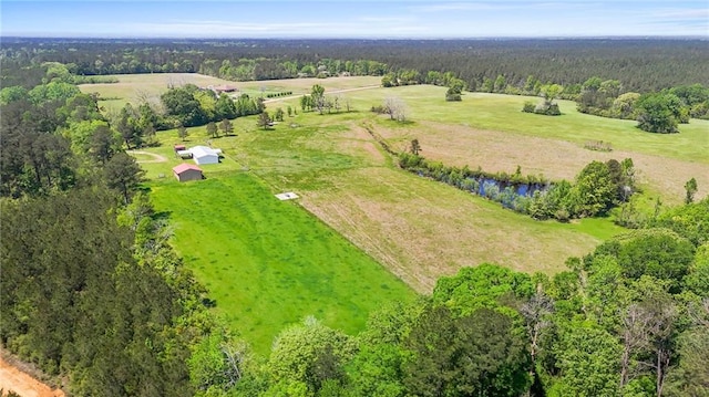1510 Pumping Station Rd, Greensburg, LA 70441 - birds eye view of property featuring a wooded view and a rural view