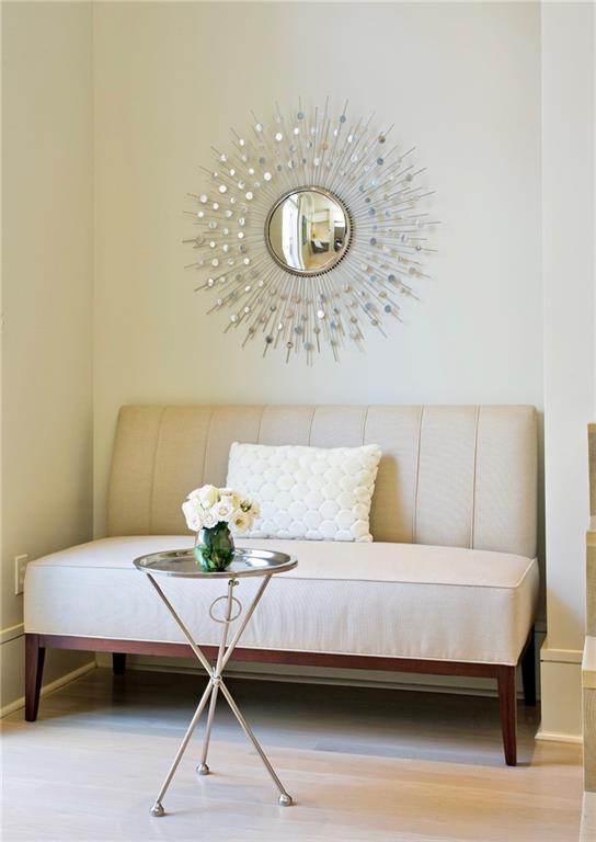 interior space featuring baseboards and wood finished floors