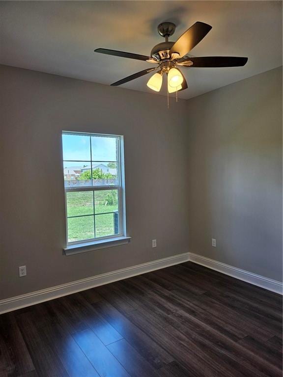 719 Rue St, Michael, Terrytown, LA 70056 - spare room with dark wood finished floors and ceiling fan