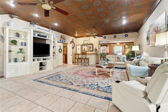 313 Sarah Victoria Dr, Belle Chasse, LA 70037 - living room with light tile patterned floors and a ceiling fan