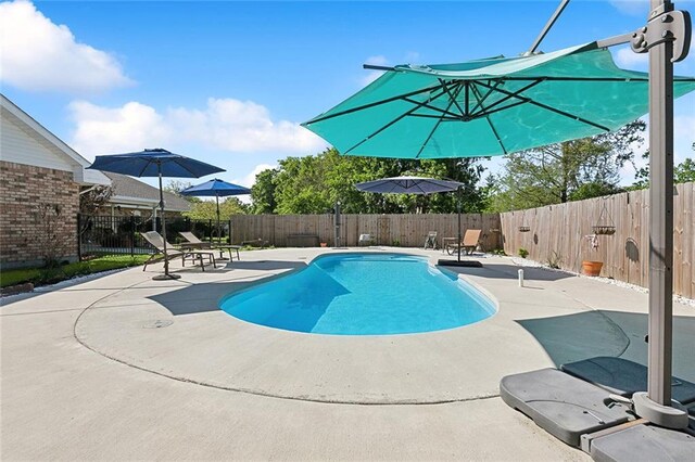 313 Sarah Victoria Dr, Belle Chasse, LA 70037 - view of pool with a fenced backyard, a fenced in pool, and a patio