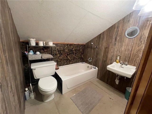 313 Sarah Victoria Dr, Belle Chasse, LA 70037 - full bath with a sink, toilet, a textured ceiling, and wooden walls