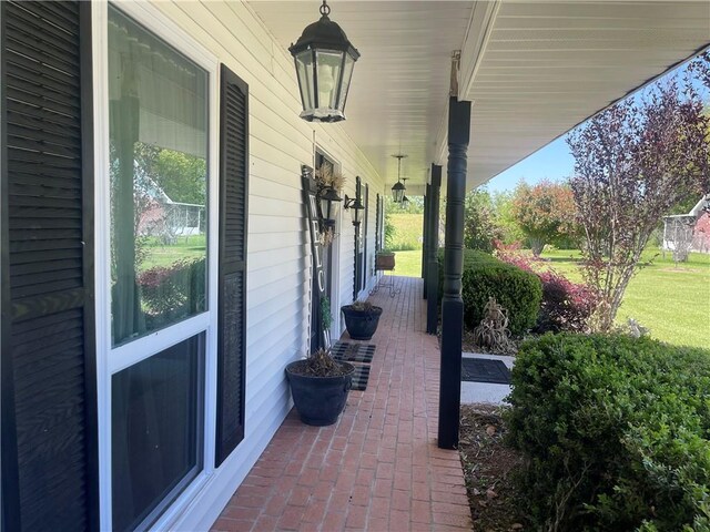 313 Sarah Victoria Dr, Belle Chasse, LA 70037 - view of patio / terrace featuring covered porch